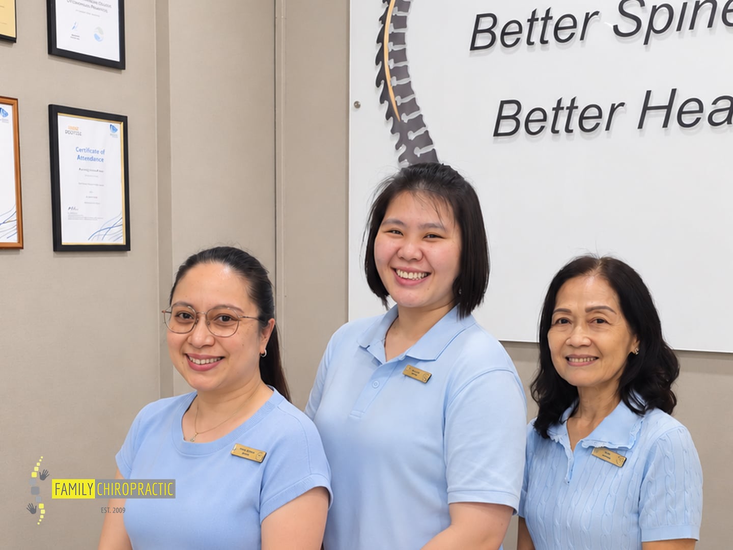 Family Chiropractic team members smiling in the Ang Mo Kio clinic
