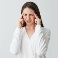 women-pain-headache Young Women Headache